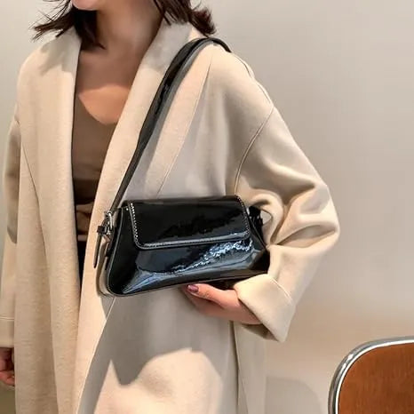 Bolsa Feminina de Ombro Vancouver - Matife 1
Bolsa Feminina de Couro Preto
bolsa feminina
bolsa de ombro
bolsa de couro
bolsa transversal
bolsa tiracolo