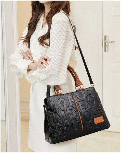 Bolsa Feminina Media De Couro Rubi