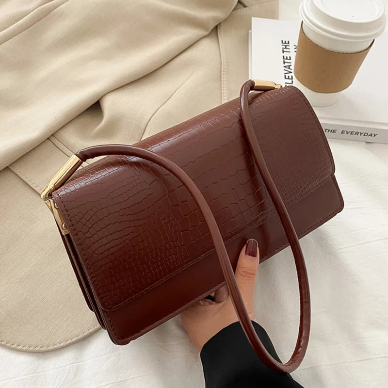 Bolsa Feminina de Ombro Zaya - Matife  1

Bolsa Feminina de Couro Marrom
bolsa feminina
bolsa de Mão
bolsa de couro